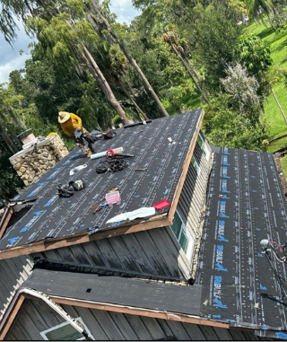 Workers installing a new roof